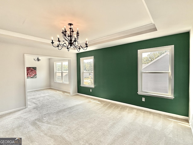 5599 Wheeler Ridge Rd, Auburn, GA 30011 - carpeted empty room featuring a chandelier, plenty of natural light, and a tray ceiling