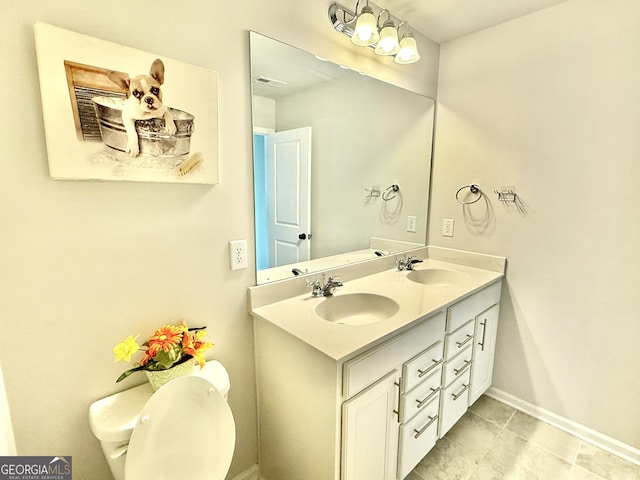 5599 Wheeler Ridge Rd, Auburn, GA 30011 - bathroom with double vanity and tile patterned flooring