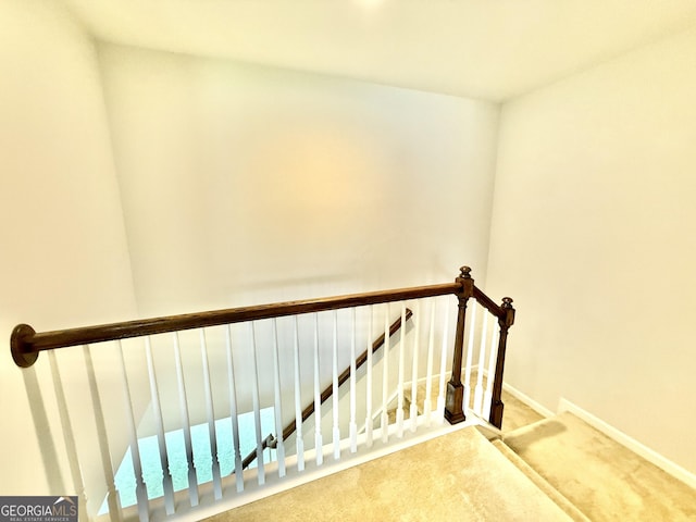 5599 Wheeler Ridge Rd, Auburn, GA 30011 - stairway with carpet flooring and baseboards