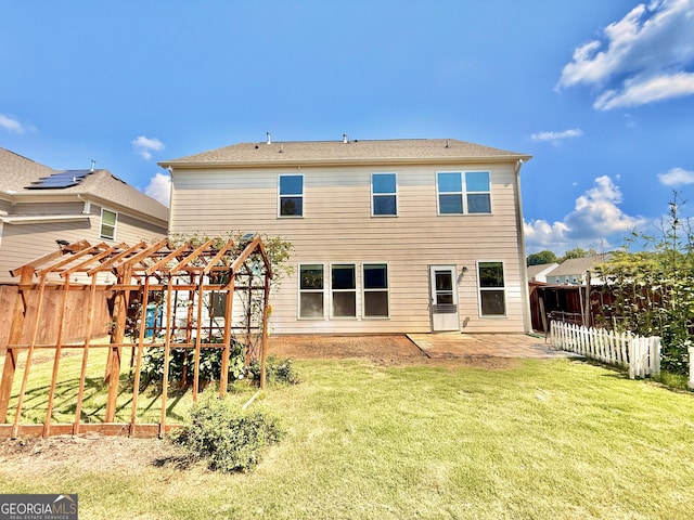 5599 Wheeler Ridge Rd, Auburn, GA 30011 - rear view of house featuring a patio area and a fenced backyard