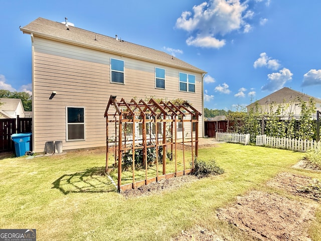 5599 Wheeler Ridge Rd, Auburn, GA 30011 - back of house with a fenced backyard