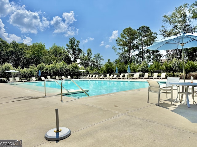 5599 Wheeler Ridge Rd, Auburn, GA 30011 - community pool featuring a patio area