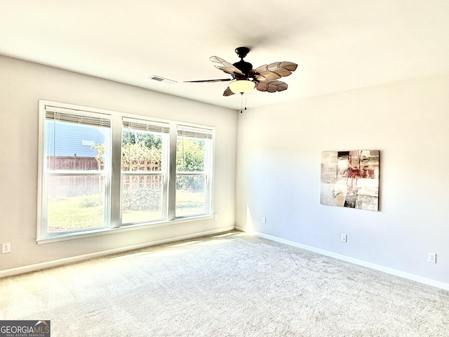 5599 Wheeler Ridge Rd, Auburn, GA 30011 - unfurnished room featuring ceiling fan and carpet