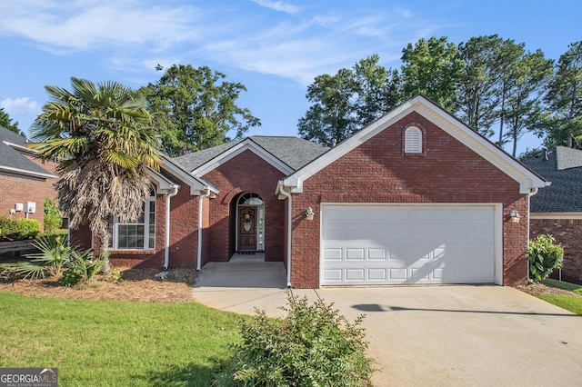 286 Prominent Loop, Mcdonough, GA 30253 - view of front of property with brick siding, concrete driveway, a garage, and a front lawn