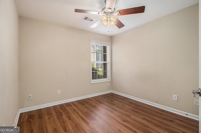 286 Prominent Loop, Mcdonough, GA 30253 - spare room with dark wood-type flooring, ceiling fan, and a textured ceiling