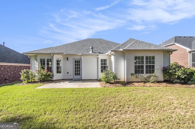 286 Prominent Loop, Mcdonough, GA 30253 - back of property featuring a patio, a lawn, and a shingled roof