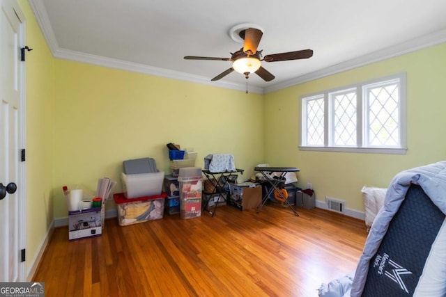 2628 Tanglewood Rd, Decatur, GA 30033 - bedroom featuring crown molding, wood finished floors, and ceiling fan