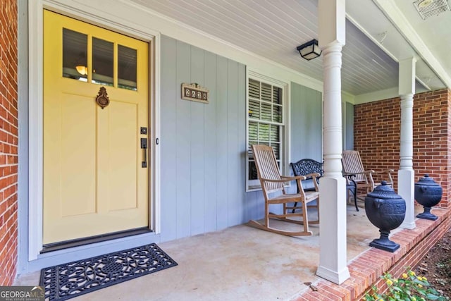 2628 Tanglewood Rd, Decatur, GA 30033 - entrance to property with a porch and brick siding