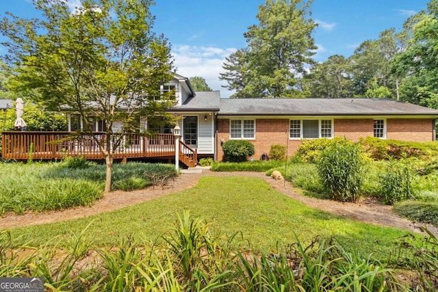 2628 Tanglewood Rd, Decatur, GA 30033 - view of front of house with a deck, brick siding, and a front lawn