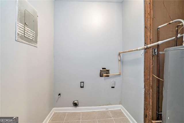 3918 S Creek Ct, Stone Mountain, GA 30083 - laundry room with electric dryer hookup, tile patterned flooring, and water heater