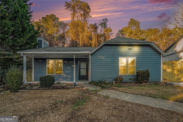 3918 S Creek Ct, Stone Mountain, GA 30083 - view of front of house with a chimney and a porch