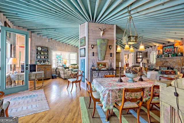 165 Pepe Rd, Clayton, GA 30525 - dining area featuring wood walls and wood finished floors