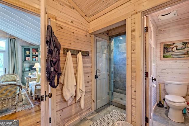 165 Pepe Rd, Clayton, GA 30525 - bathroom with wood walls, a shower stall, and lofted ceiling