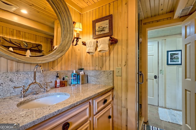 165 Pepe Rd, Clayton, GA 30525 - bathroom featuring vanity, tile patterned floors, wood ceiling, and wooden walls