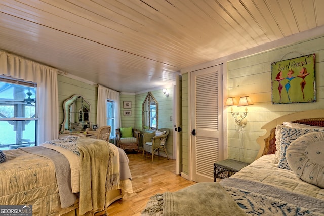 165 Pepe Rd, Clayton, GA 30525 - bedroom with wood walls, wood ceiling, and light wood finished floors