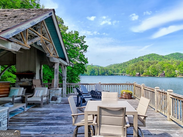 165 Pepe Rd, Clayton, GA 30525 - deck featuring a wooded view, a water view, and outdoor dining space