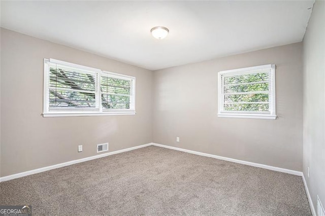 4009 Kirksford Dr, Decatur, GA 30035 - unfurnished room featuring plenty of natural light and carpet flooring
