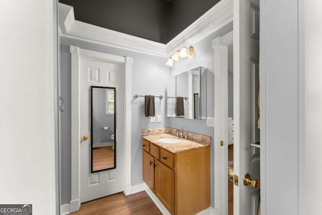 15 Miners Pt SE, Acworth, GA 30102 - bathroom featuring vanity, wood finished floors, and crown molding