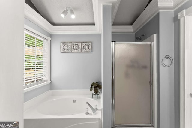 15 Miners Pt SE, Acworth, GA 30102 - bathroom with a stall shower, a garden tub, ornamental molding, and a textured ceiling