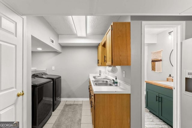 15 Miners Pt SE, Acworth, GA 30102 - washroom featuring washing machine and clothes dryer and light tile patterned flooring
