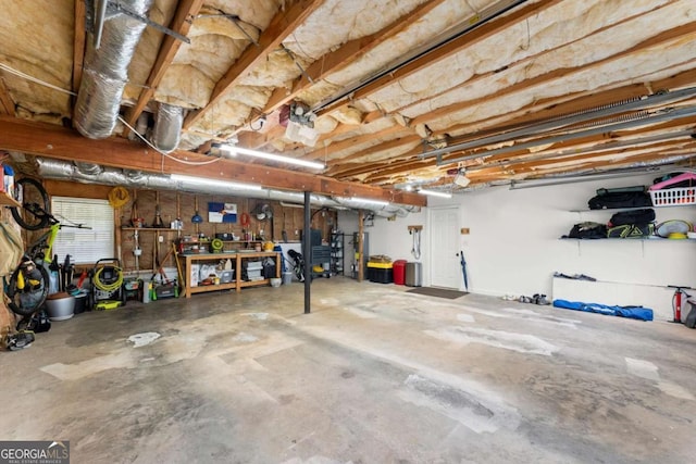 15 Miners Pt SE, Acworth, GA 30102 - garage with a workshop area