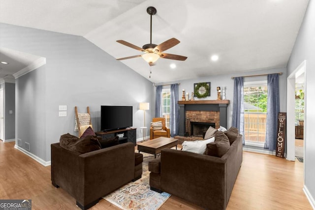 15 Miners Pt SE, Acworth, GA 30102 - living room featuring lofted ceiling, a brick fireplace, ceiling fan, light wood-style flooring, and recessed lighting