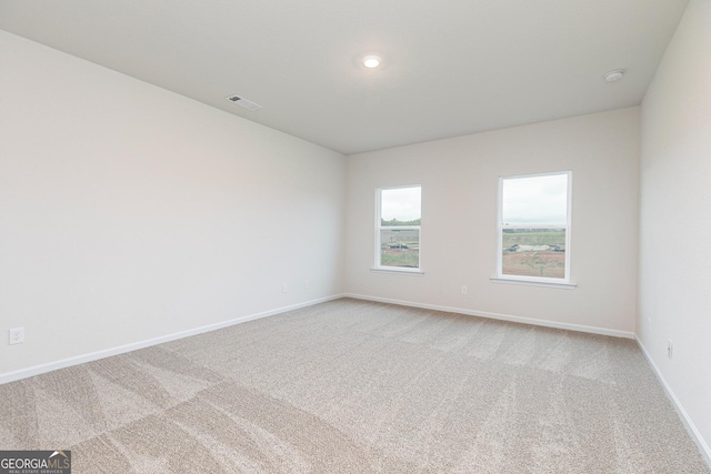 1512 Big Bud Ln, Locust Grove, GA 30248 - unfurnished room featuring carpet flooring and recessed lighting
