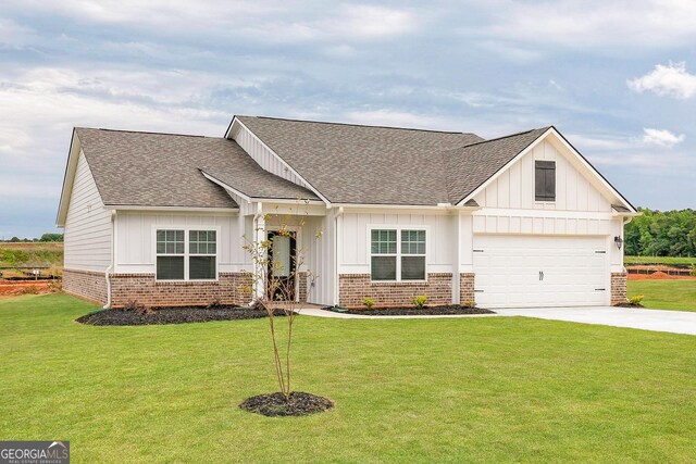 1512 Big Bud Ln, Locust Grove, GA 30248 - view of front of house with board and batten siding, roof with shingles, driveway, and a front yard