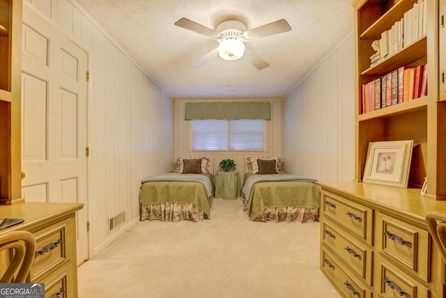 2400 White Pine Ln, Mansfield, GA 30055 - bedroom with carpet, ornamental molding, a textured ceiling, and a ceiling fan