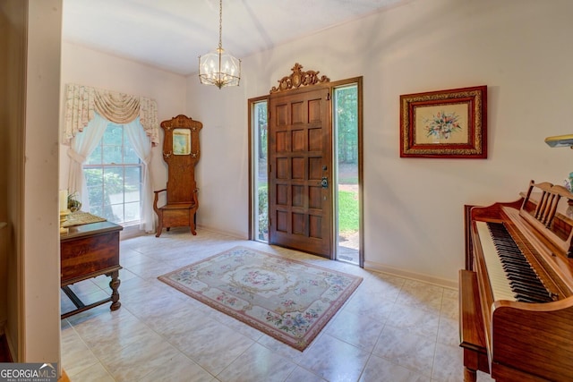 2400 White Pine Ln, Mansfield, GA 30055 - foyer featuring a chandelier and baseboards