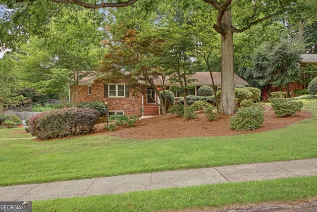 1693 Alderbrook Rd NE, Atlanta, GA 30345 - view of front of property featuring a front yard and brick siding