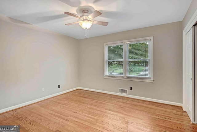 1693 Alderbrook Rd NE, Atlanta, GA 30345 - unfurnished bedroom featuring light wood-style flooring, a closet, and a ceiling fan