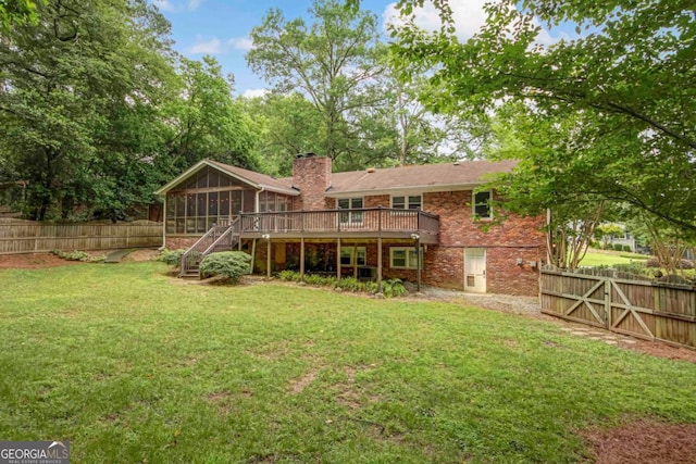 1693 Alderbrook Rd NE, Atlanta, GA 30345 - back of house with a sunroom, a chimney, stairs, a wooden deck, and a fenced backyard