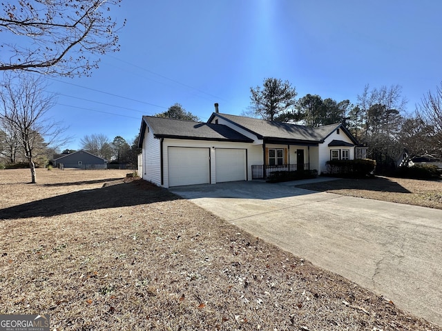 4035 Winchester Way, Loganville, GA 30052 - single story home featuring covered porch, a garage, and concrete driveway