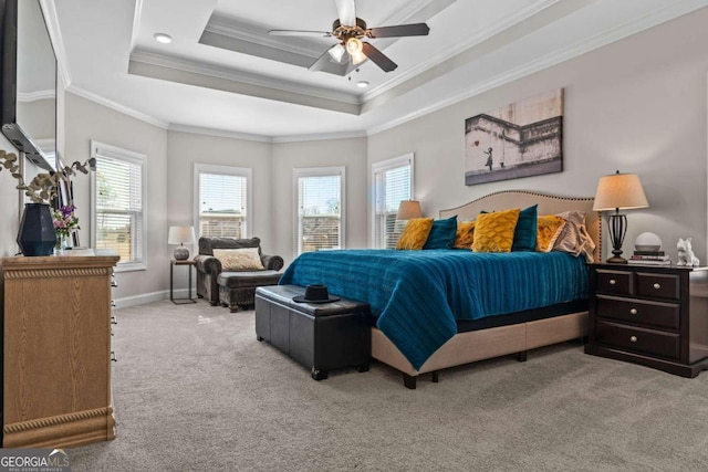 1118 Coralbell Dr, Statham, GA 30666 - carpeted bedroom featuring ornamental molding, a raised ceiling, and ceiling fan