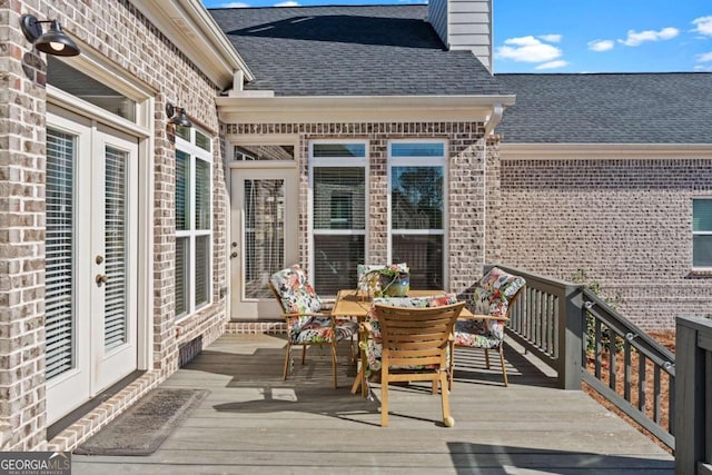 1118 Coralbell Dr, Statham, GA 30666 - wooden terrace featuring french doors and outdoor dining space