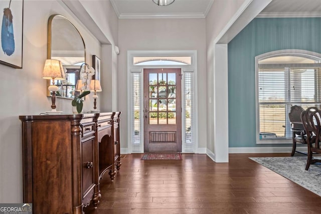 1118 Coralbell Dr, Statham, GA 30666 - foyer featuring dark wood-style floors and ornamental molding