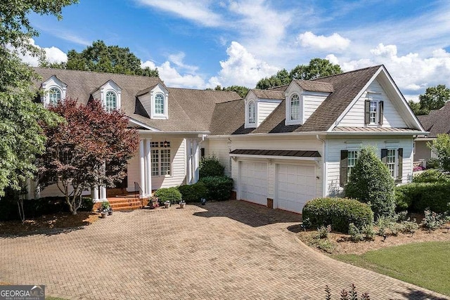 2052 Trimleston Rd, Statham, GA 30666 - cape cod-style house with an attached garage and decorative driveway