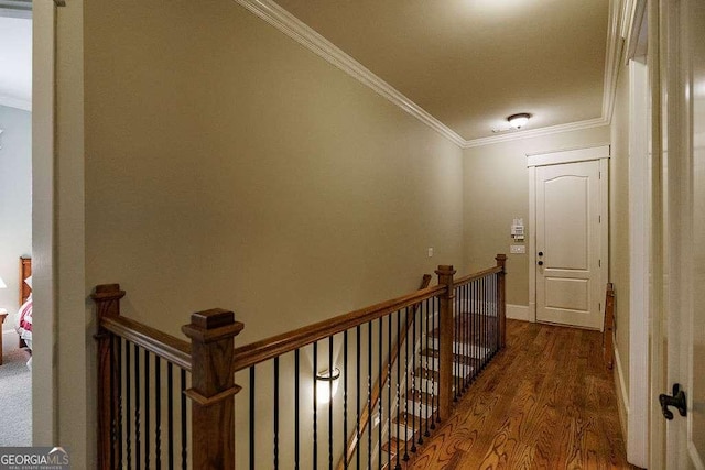 2052 Trimleston Rd, Statham, GA 30666 - hallway featuring an upstairs landing, crown molding, and wood finished floors
