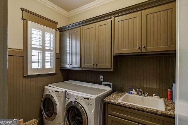 2052 Trimleston Rd, Statham, GA 30666 - washroom featuring cabinet space, washing machine and dryer, ornamental molding, wooden walls, and a wainscoted wall
