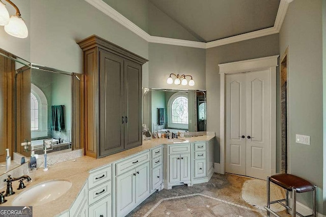 2052 Trimleston Rd, Statham, GA 30666 - full bathroom with double vanity, vaulted ceiling, and crown molding