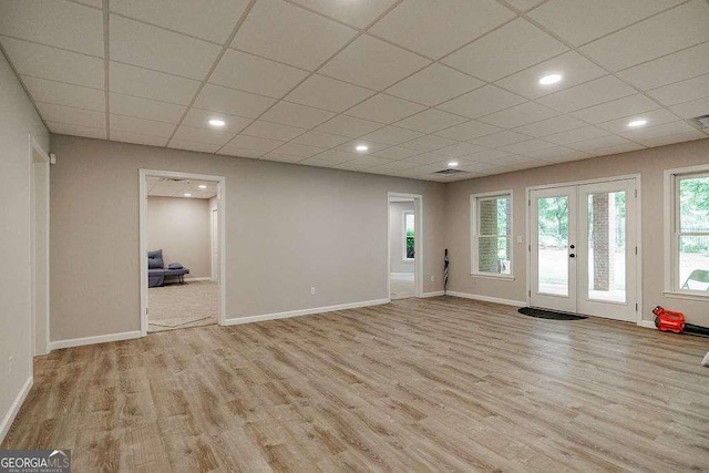 2052 Trimleston Rd, Statham, GA 30666 - spare room featuring wood finished floors, french doors, a paneled ceiling, and recessed lighting