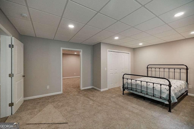 2052 Trimleston Rd, Statham, GA 30666 - carpeted bedroom with recessed lighting, a closet, and a paneled ceiling