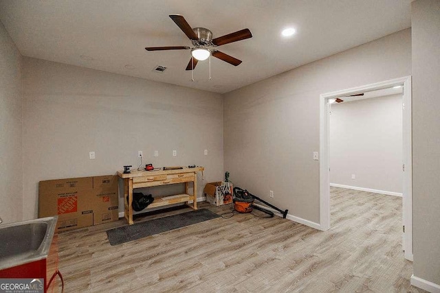 2052 Trimleston Rd, Statham, GA 30666 - miscellaneous room with wood finished floors, ceiling fan, and recessed lighting
