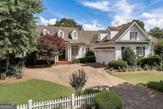 2052 Trimleston Rd, Statham, GA 30666 - new england style home featuring a garage and decorative driveway
