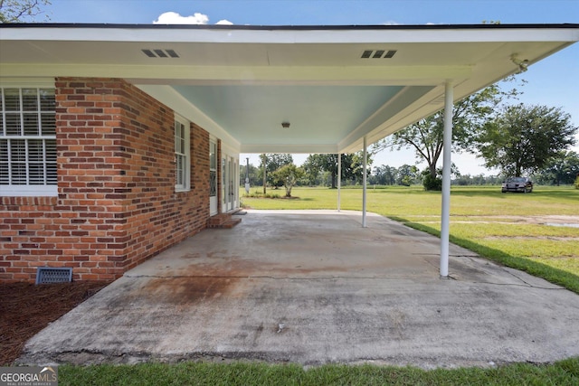 788 Buie Cir, Pembroke, GA 31321 - view of patio featuring an attached carport