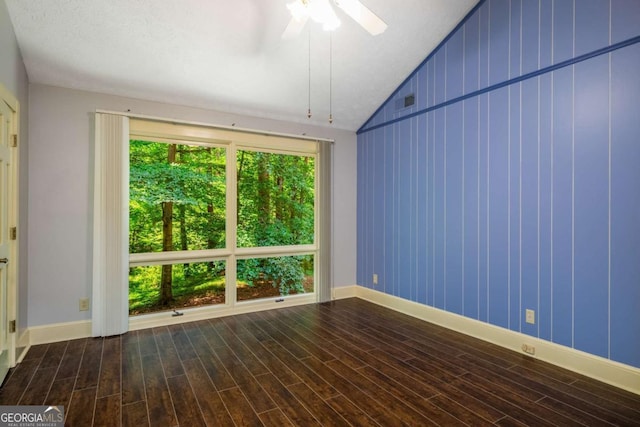 1690 Trotters Ln, Stone Mountain, GA 30087 - empty room featuring wood finished floors, a ceiling fan, and vaulted ceiling