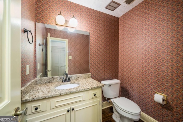 1690 Trotters Ln, Stone Mountain, GA 30087 - bathroom featuring toilet and vanity