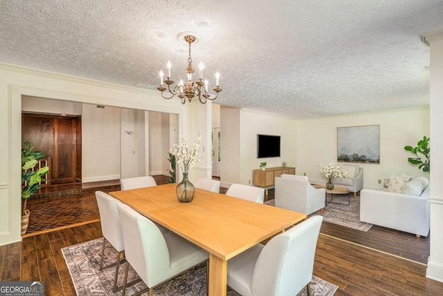 1690 Trotters Ln, Stone Mountain, GA 30087 - dining room with a textured ceiling, hardwood / wood-style flooring, and a chandelier