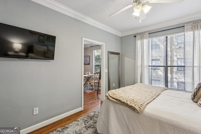 3777 Peachtree Rd NE Unit 1216, Atlanta, GA 30319 - bedroom with wood finished floors, ornamental molding, and ceiling fan